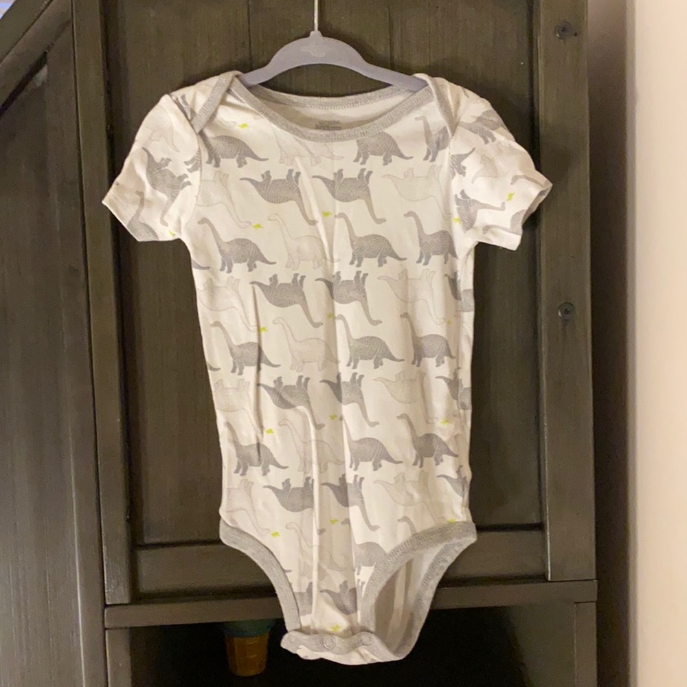 Dino Carter’s onesie